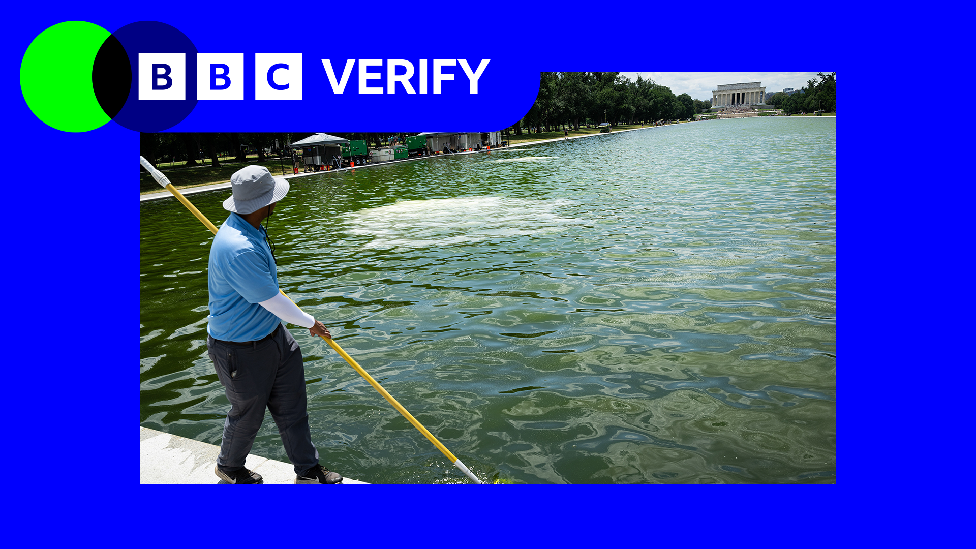 A worker cleaning the reflecting pool in Washington DC with the Lincoln Memorial monument in the background.