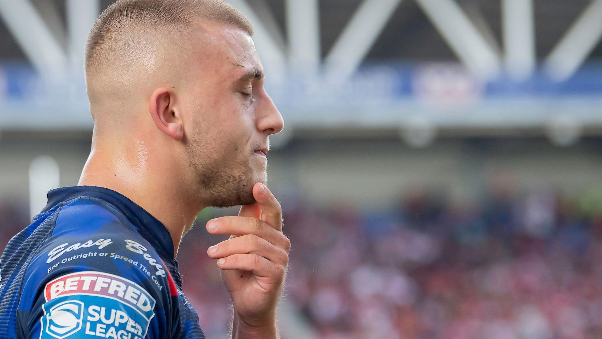 Mikey Lewis closes his eyes in rueful pondering after Hull KR lose at Wigan in the 2023 Super League play-off semi-finals