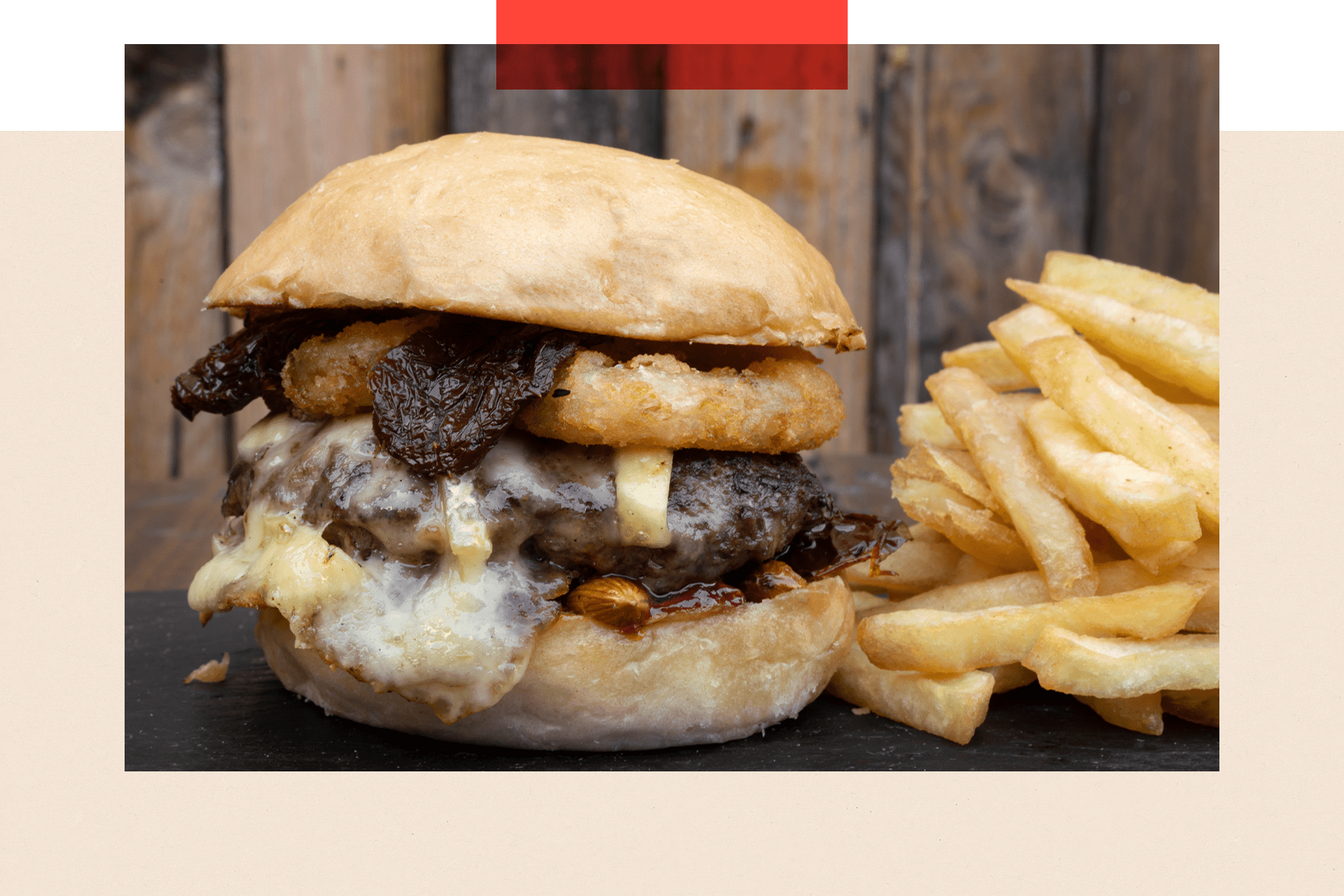 A photo of a burger and chips