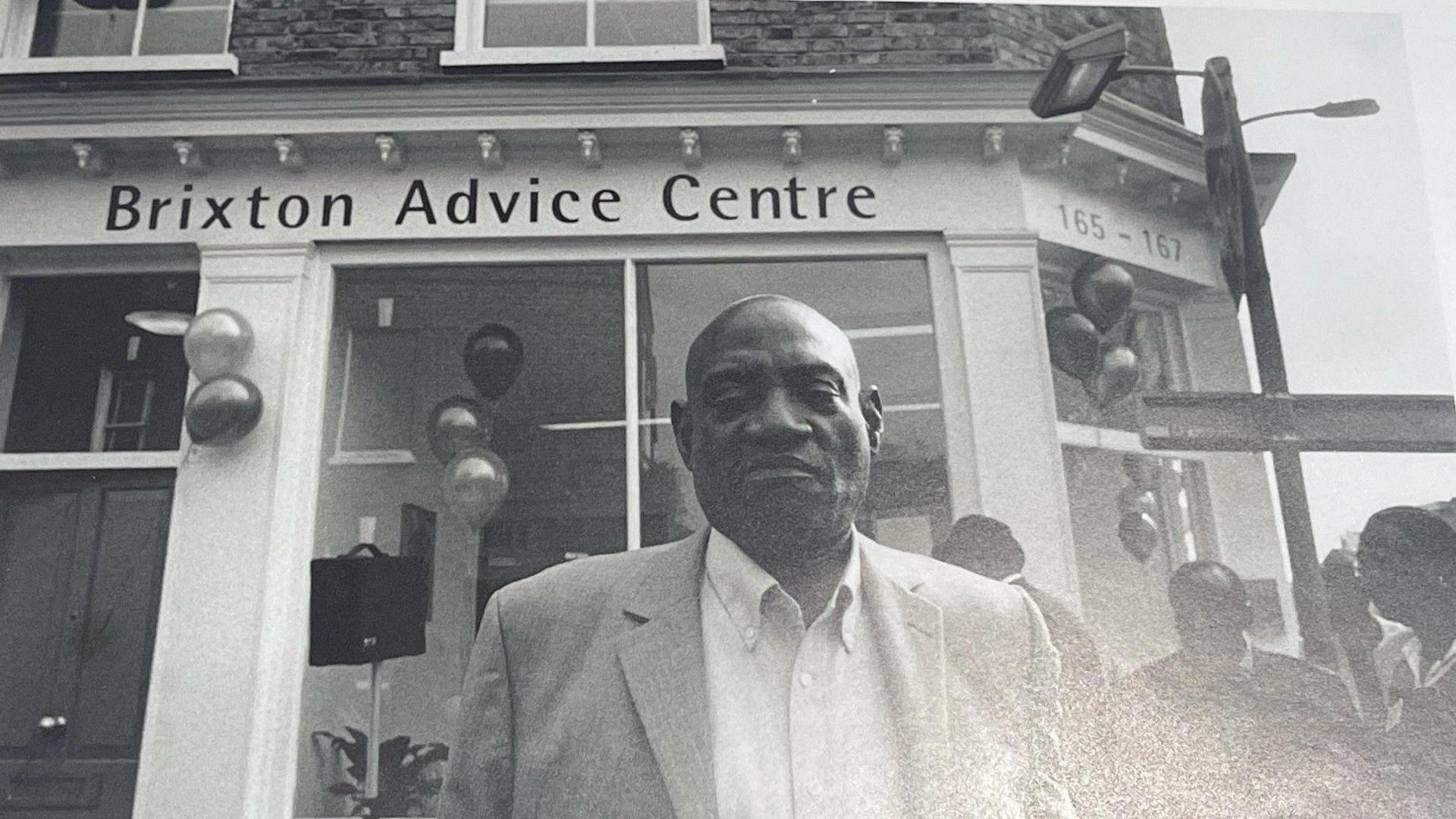 Darcus Howe standing outside the Brixton Advice Centre