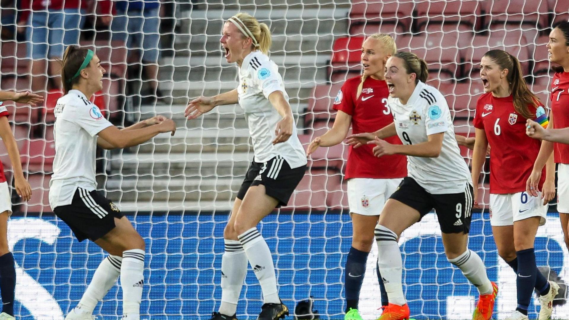 Julie Nelson celebrates her goal