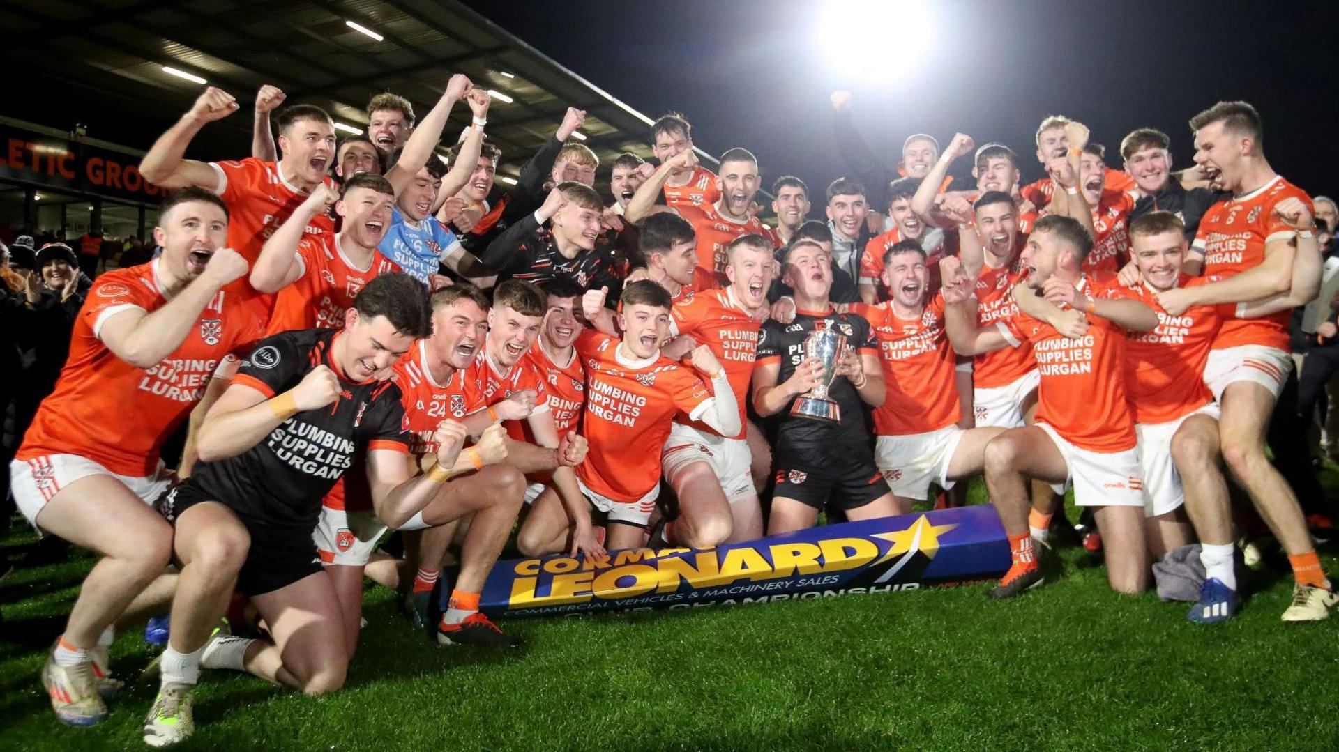 The Clann Eireann players celebrate after Saturday's 3-13 to 0-15 victory over Lurgan neighbours Clan na Gael in the Armagh Football Final