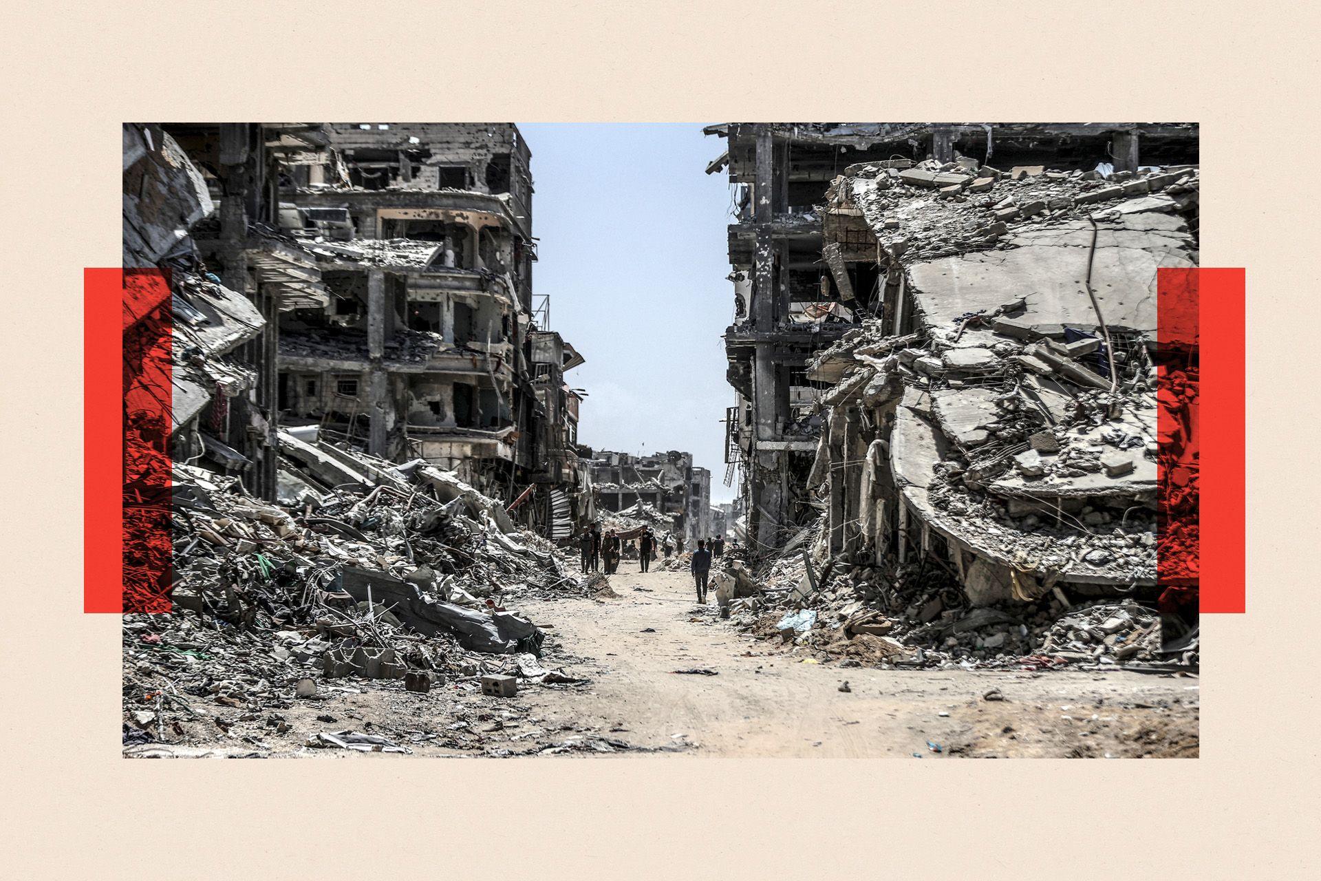 A view of collapsed buildings as Palestinians return back to their homes 