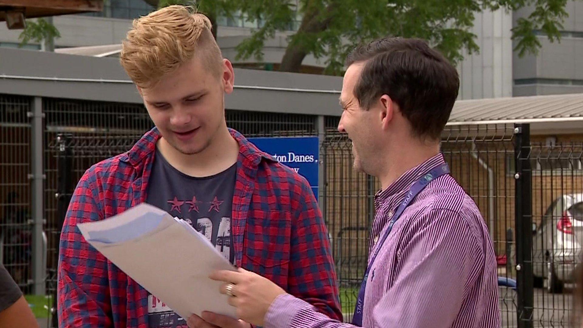 Smiling student with results