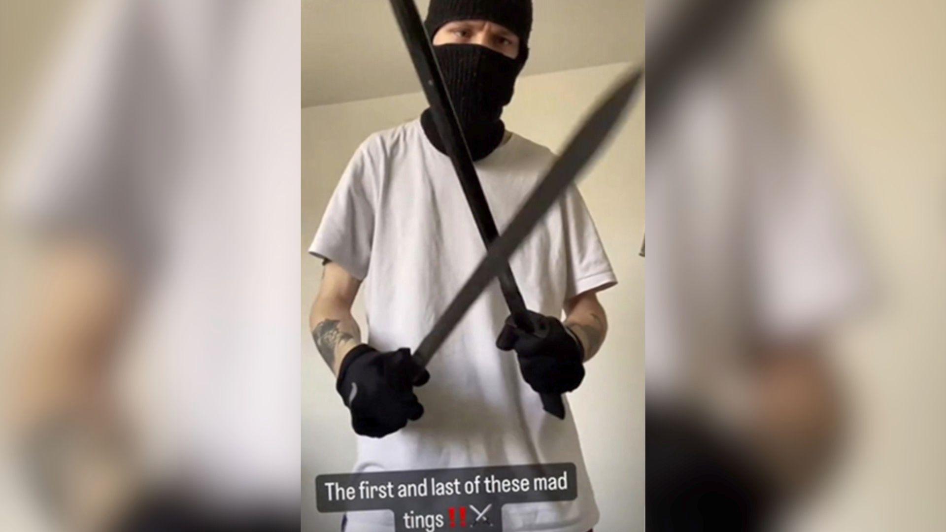 Stefan Petrescu posing with two ninja swords in a post shared online