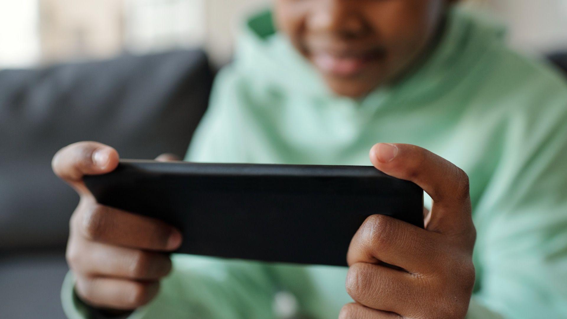 a child using a smartphone