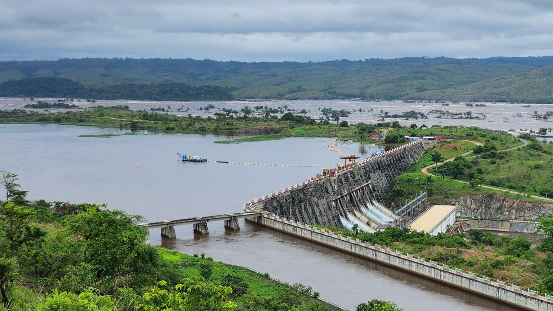 An aerial view of the Congo river and Inga 1. Lush vegetation can also be seen.