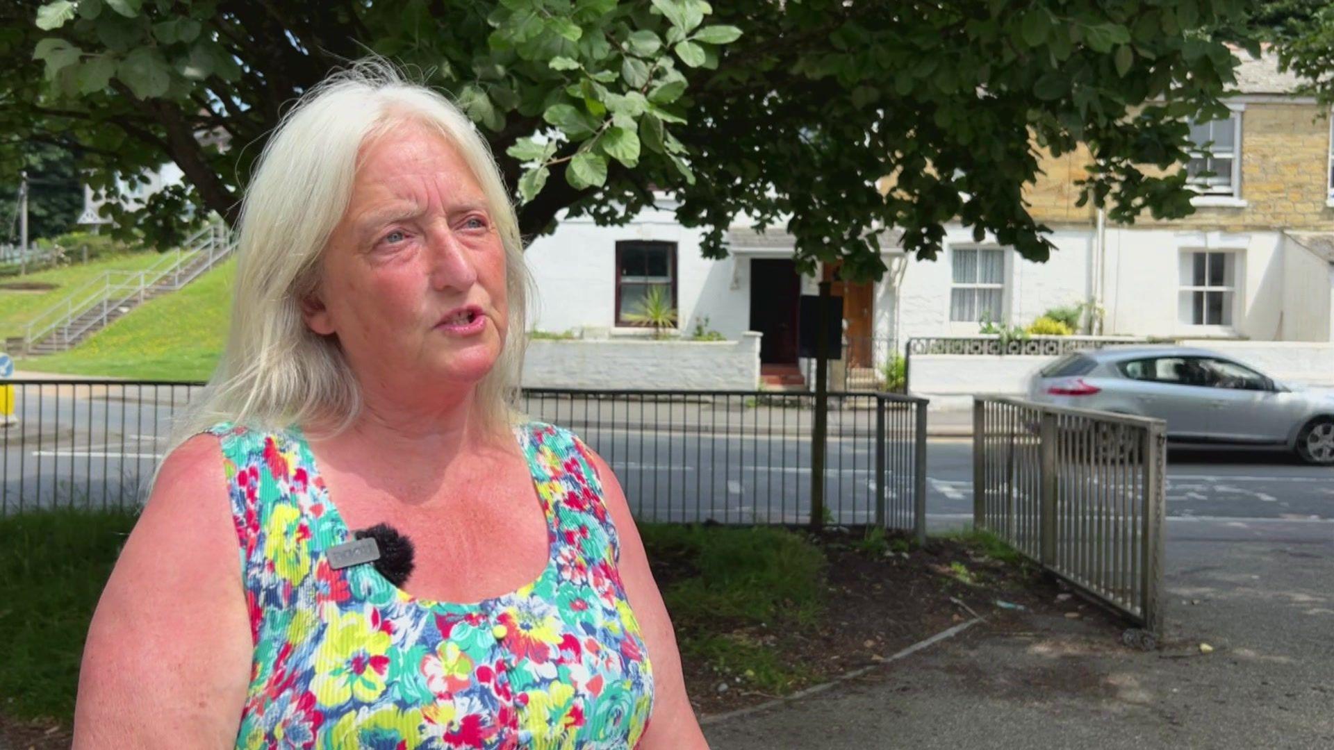 Karen La Borde in front of road