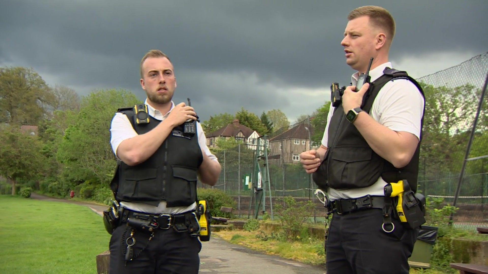 PC Jack King and PC Joe West talking on their commsradios