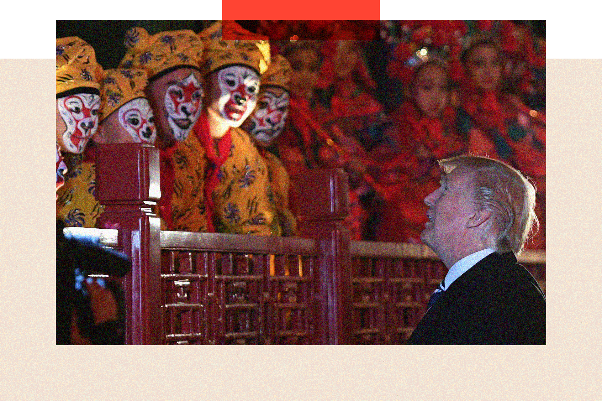 US President Donald Trump looks up and talks to opera performers at the Forbidden City in Beijing