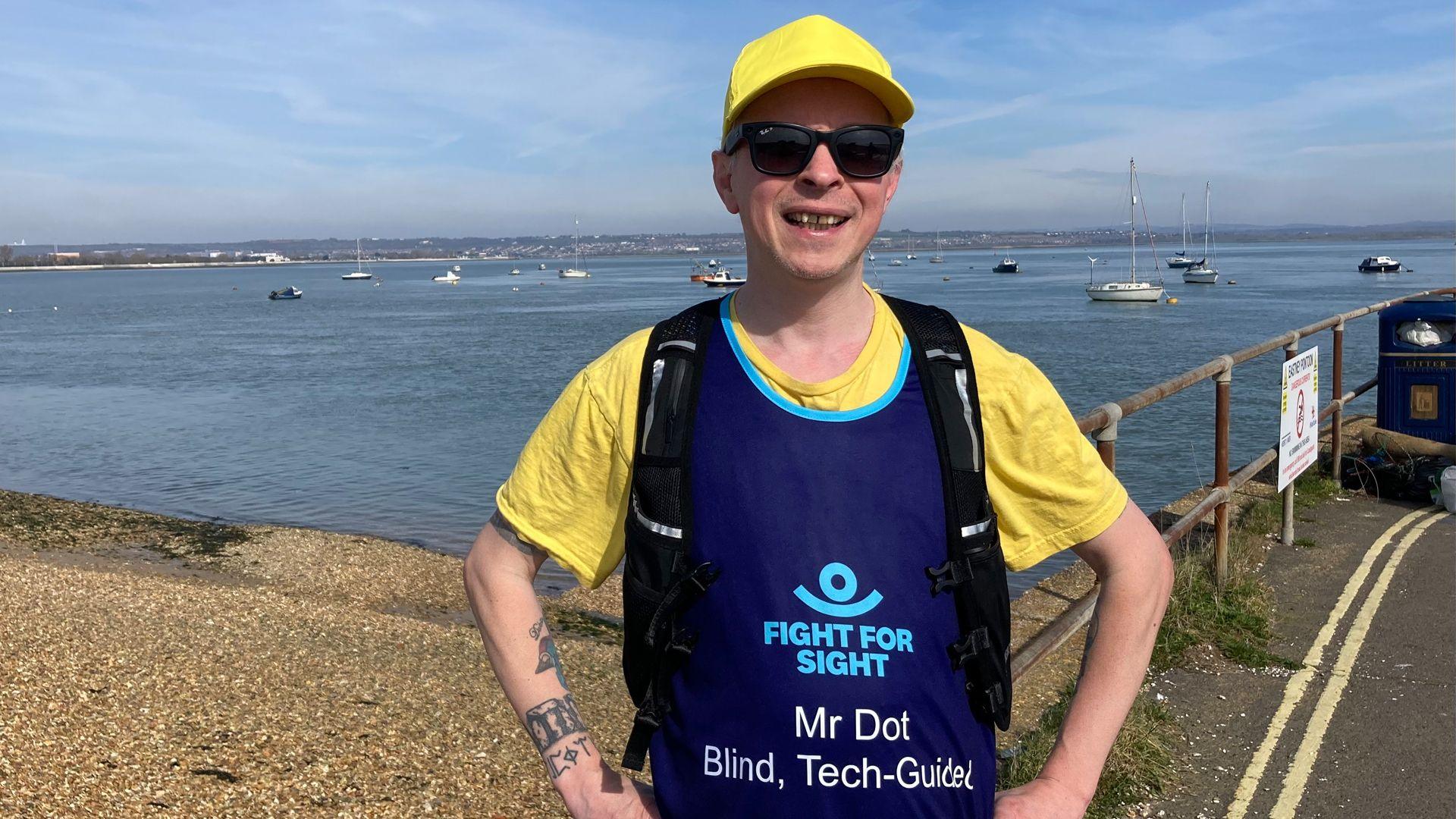 mr dot smiling and wearing running clothing and smart glasses