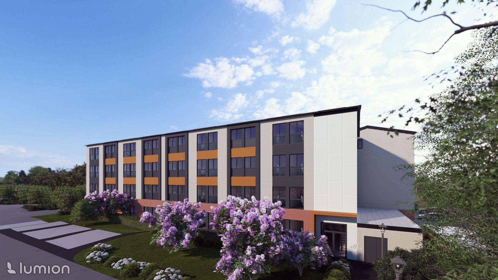 An illustrative image of the new hospital. It is a four-story white building with rows of windows on each floor. The bottom floor appears to have brick walls. The roof is mostly flat and there are purple flowers around the bottom of the building.