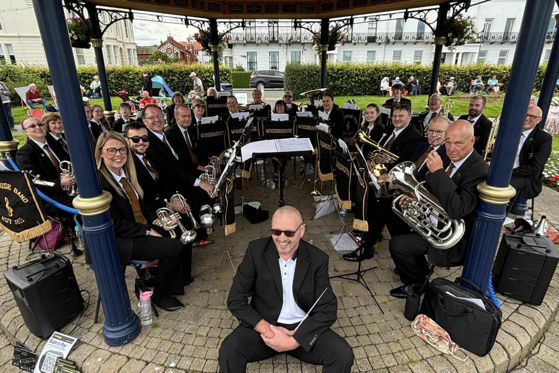 Members of the Woodhouse Prize Band with their instruments