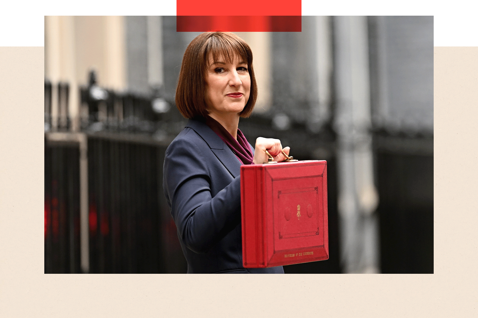 Rachel Reeves poses with the red Budget Box as she leaves Downing Street
