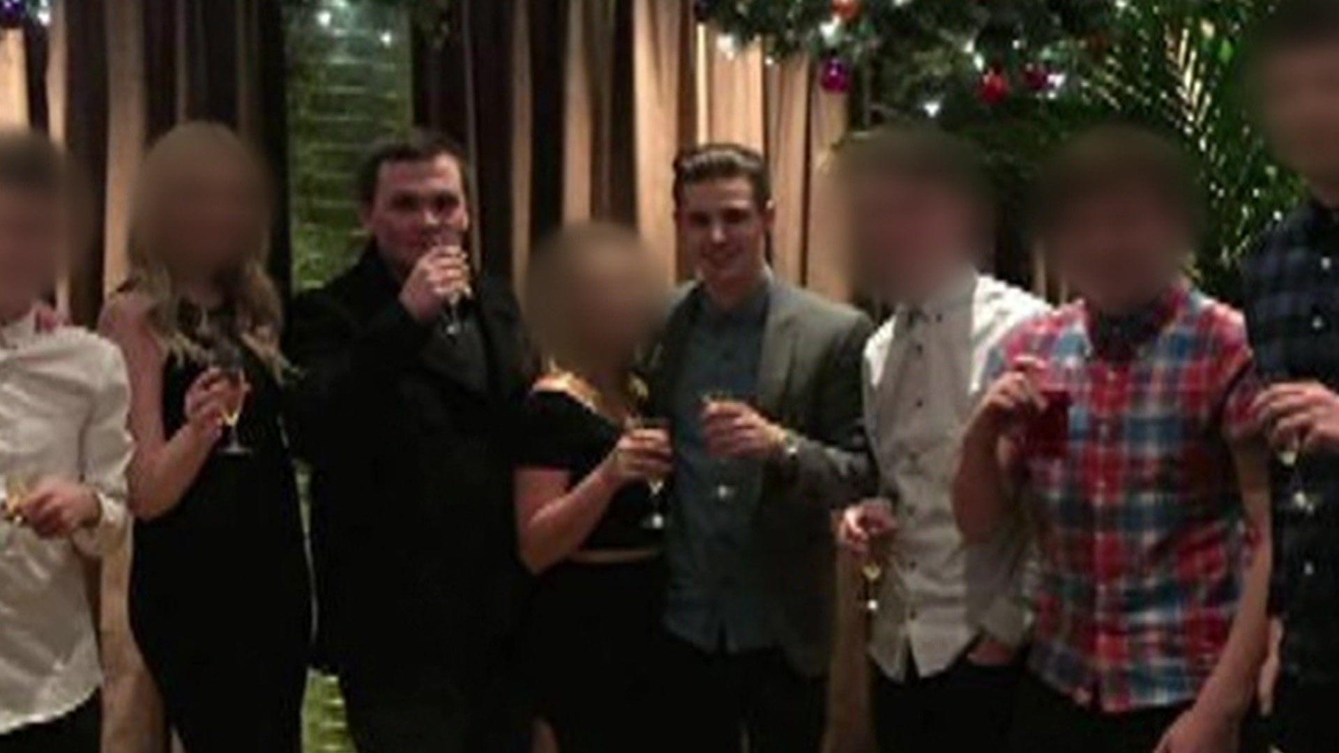 A blurred image of Jordan Daykin (left) and Macorley Bivens (right) at a party.