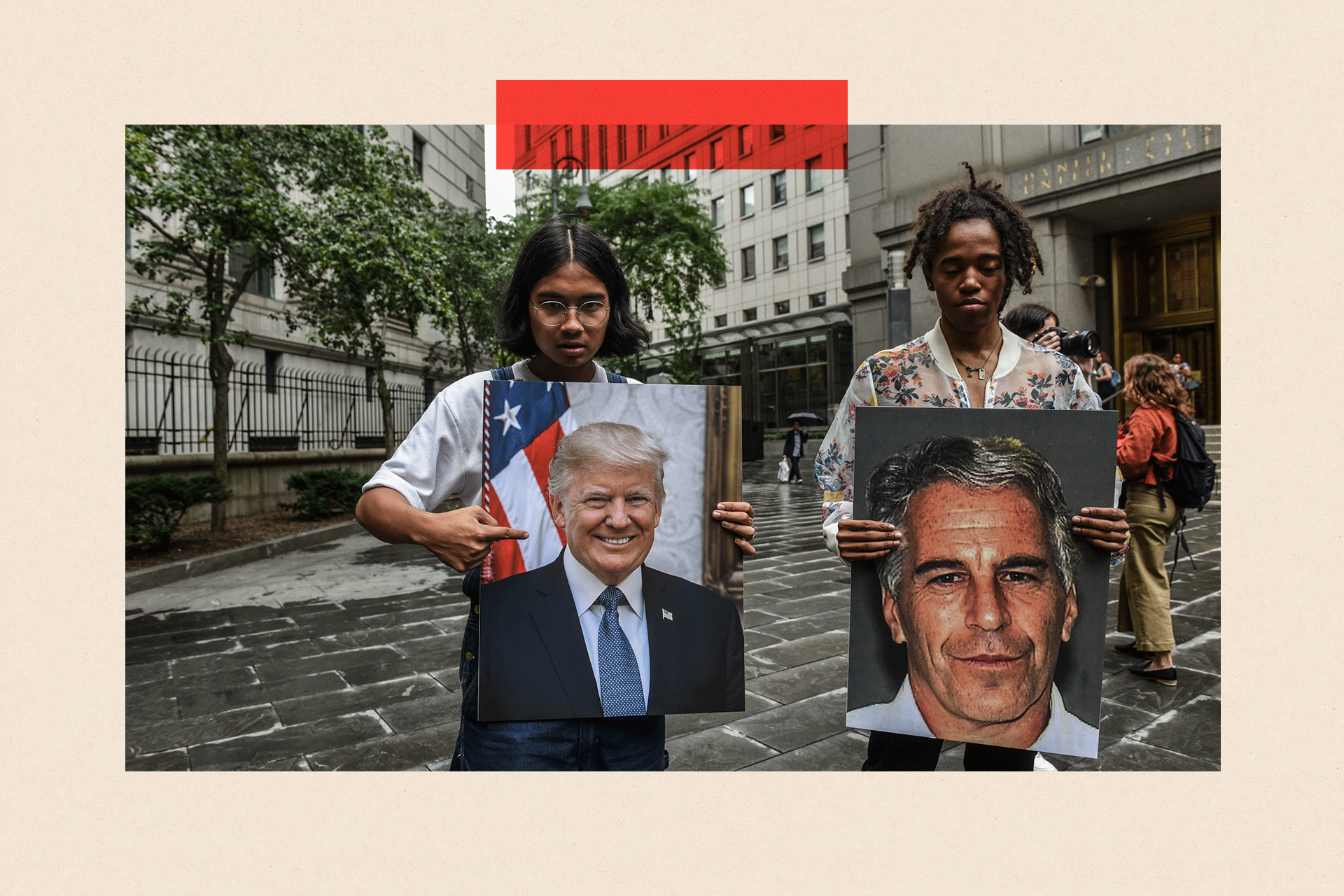 A protest group hold up signs of Jeffrey Epstein and President Donald Trump in front of the Federal courthouse