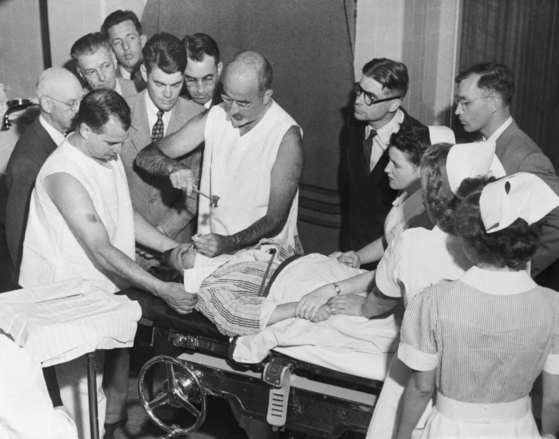 Walter Freeman demonstrating his transorbital lobotomy technique in 1949