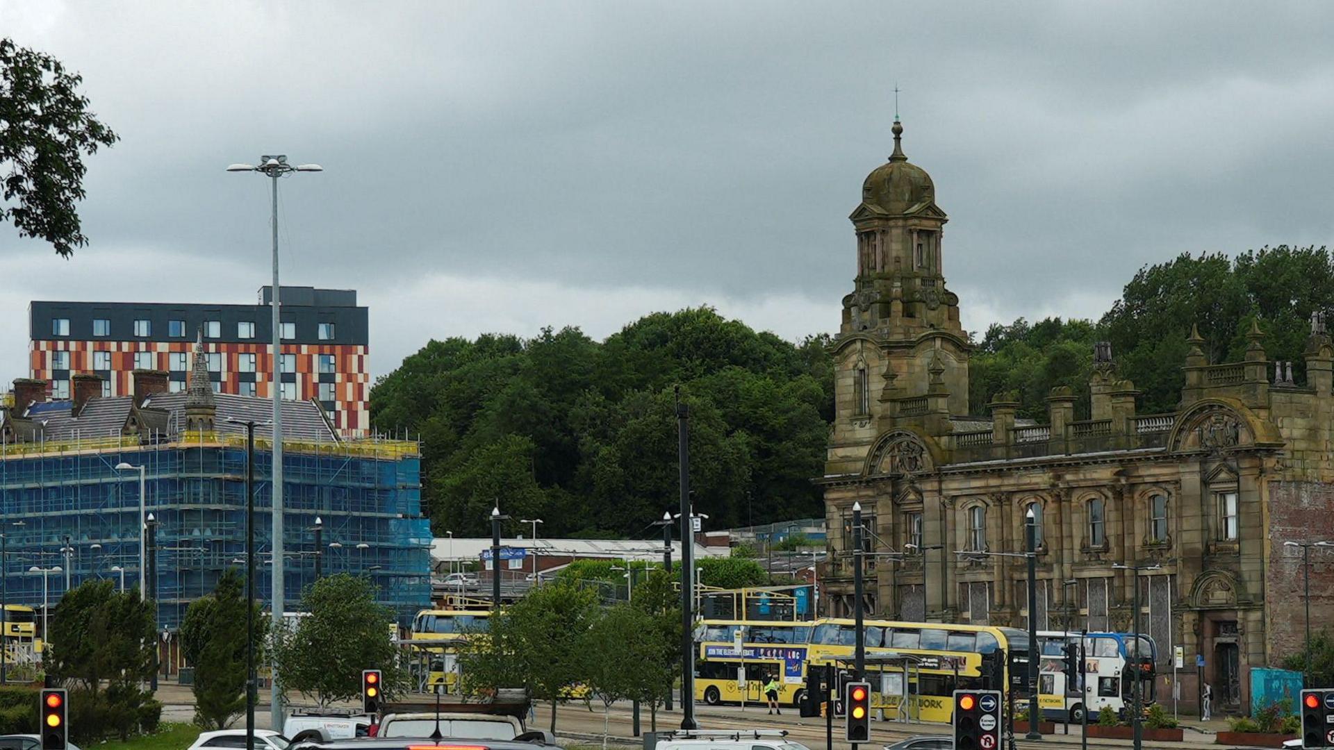 General view of Oldham - traffic - cars and buses