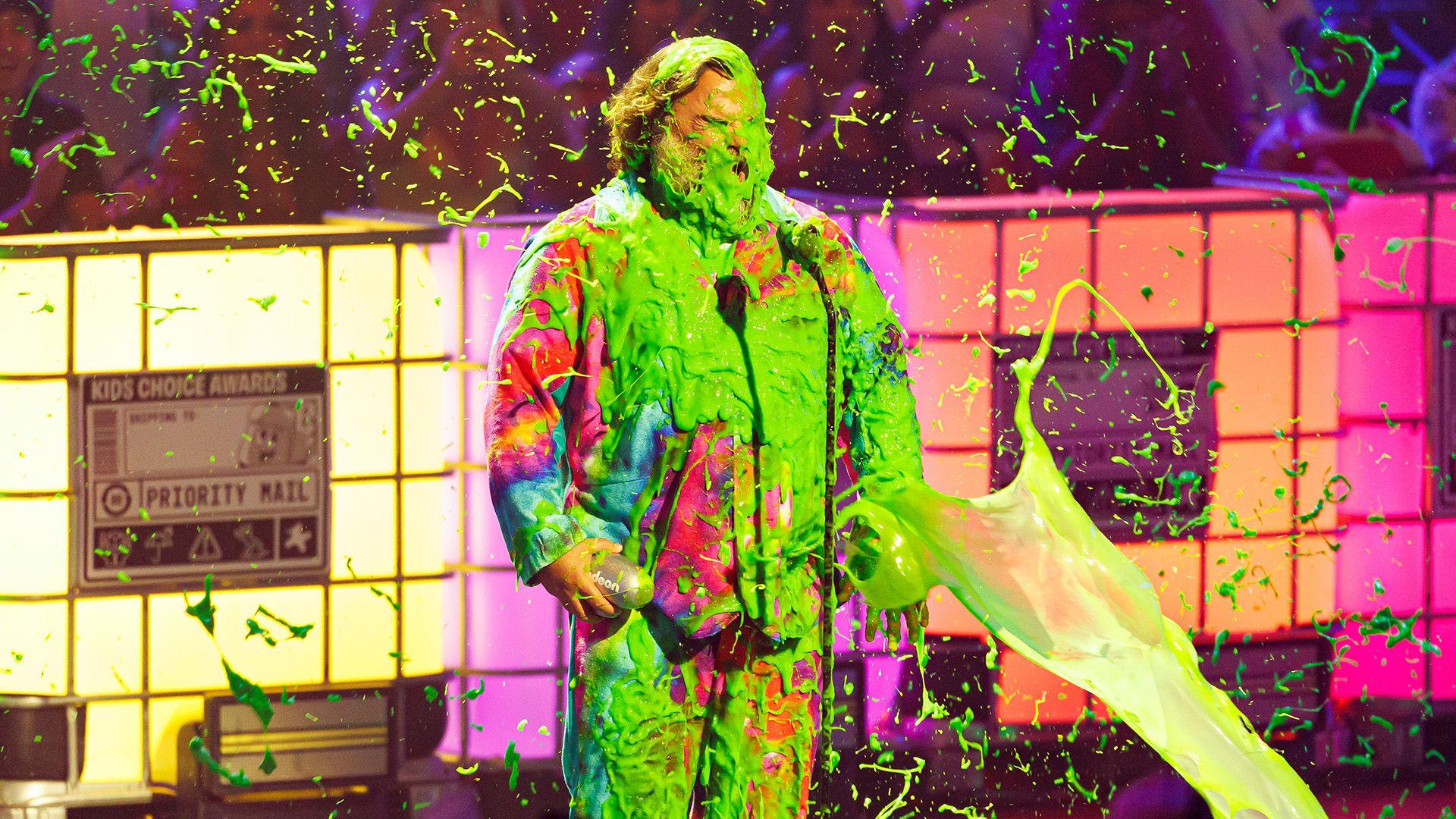 Jack Black gets slimed with green slime as he accepts his award
