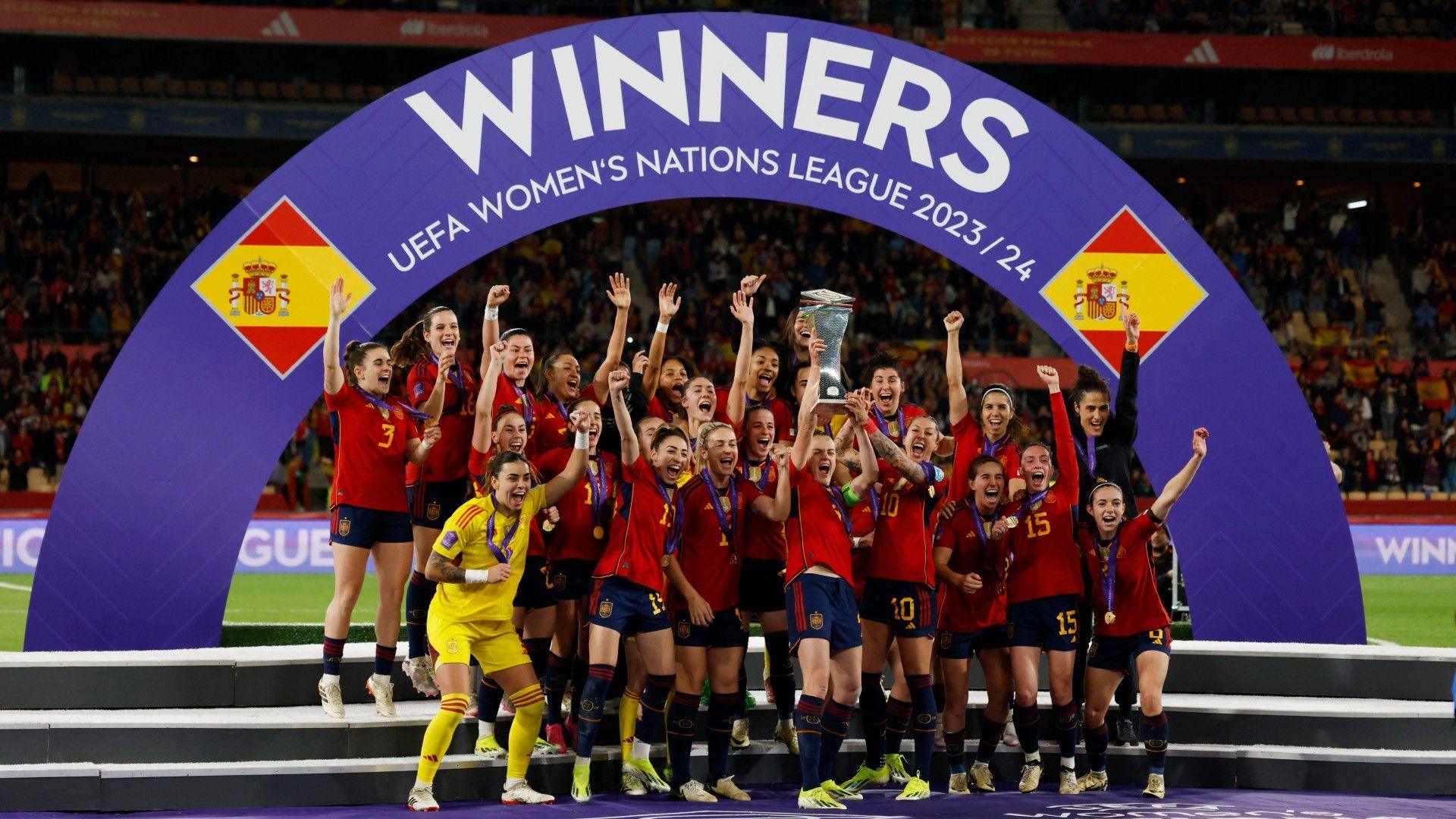 Spain players celebrate winning the UEFA Women's Nations League with the trophy
