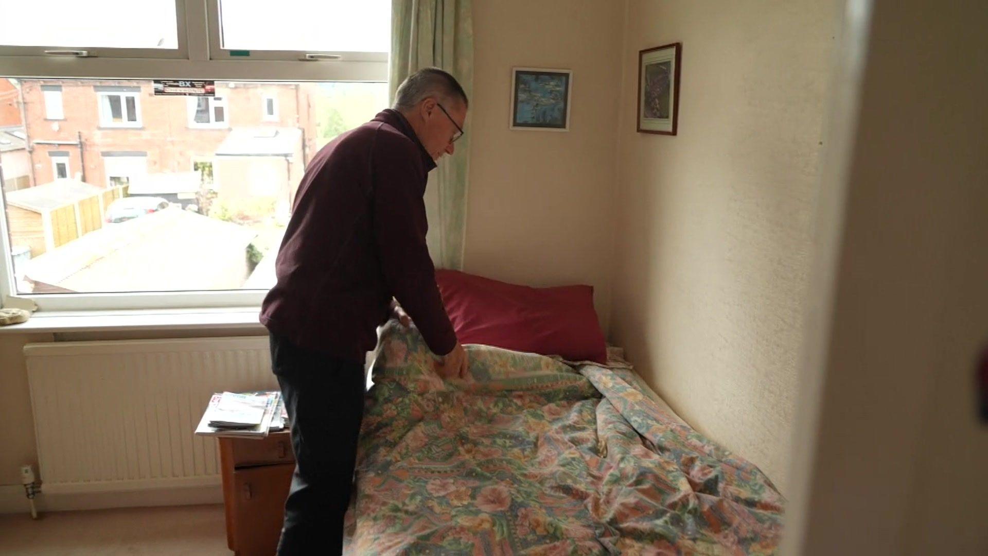 A bed being made up by dad Andrew