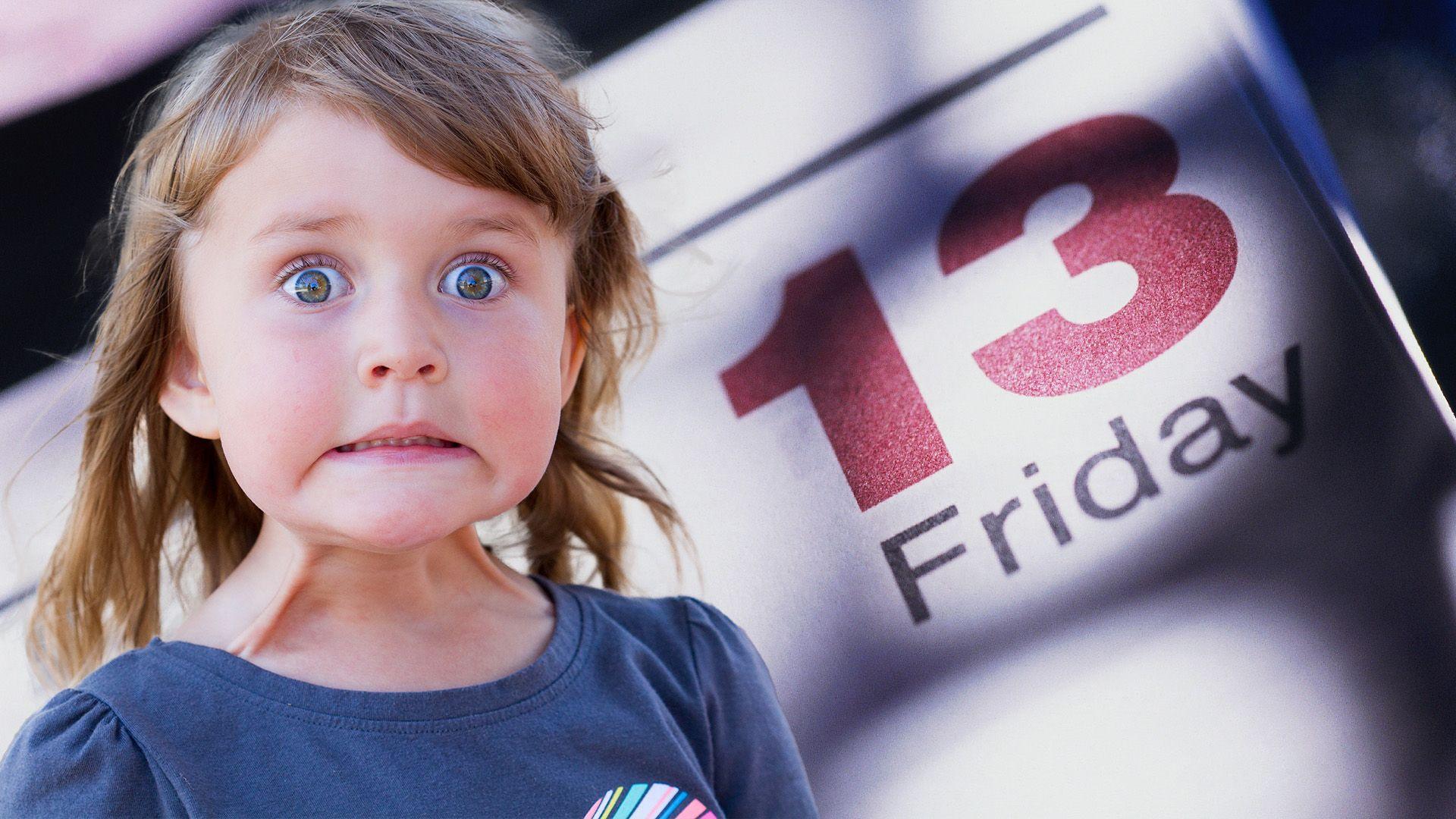 A girl makes a worried face looking at the camera. Superimposed behind her is a calendar marker saying 13 Friday