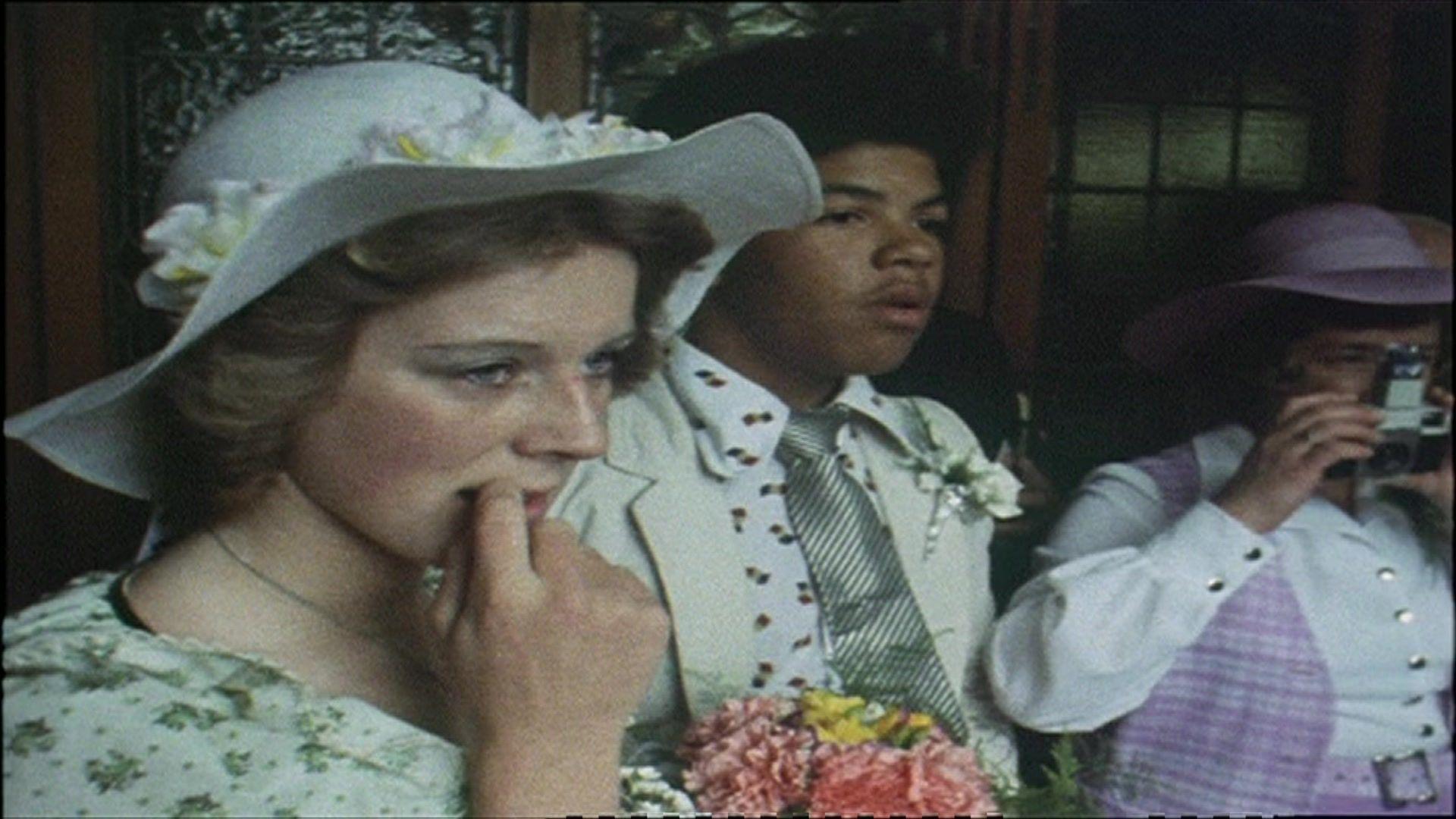 Heather, Melvin and Margaret, holding a camera awaiting Marian and Tom's arrival on The Family