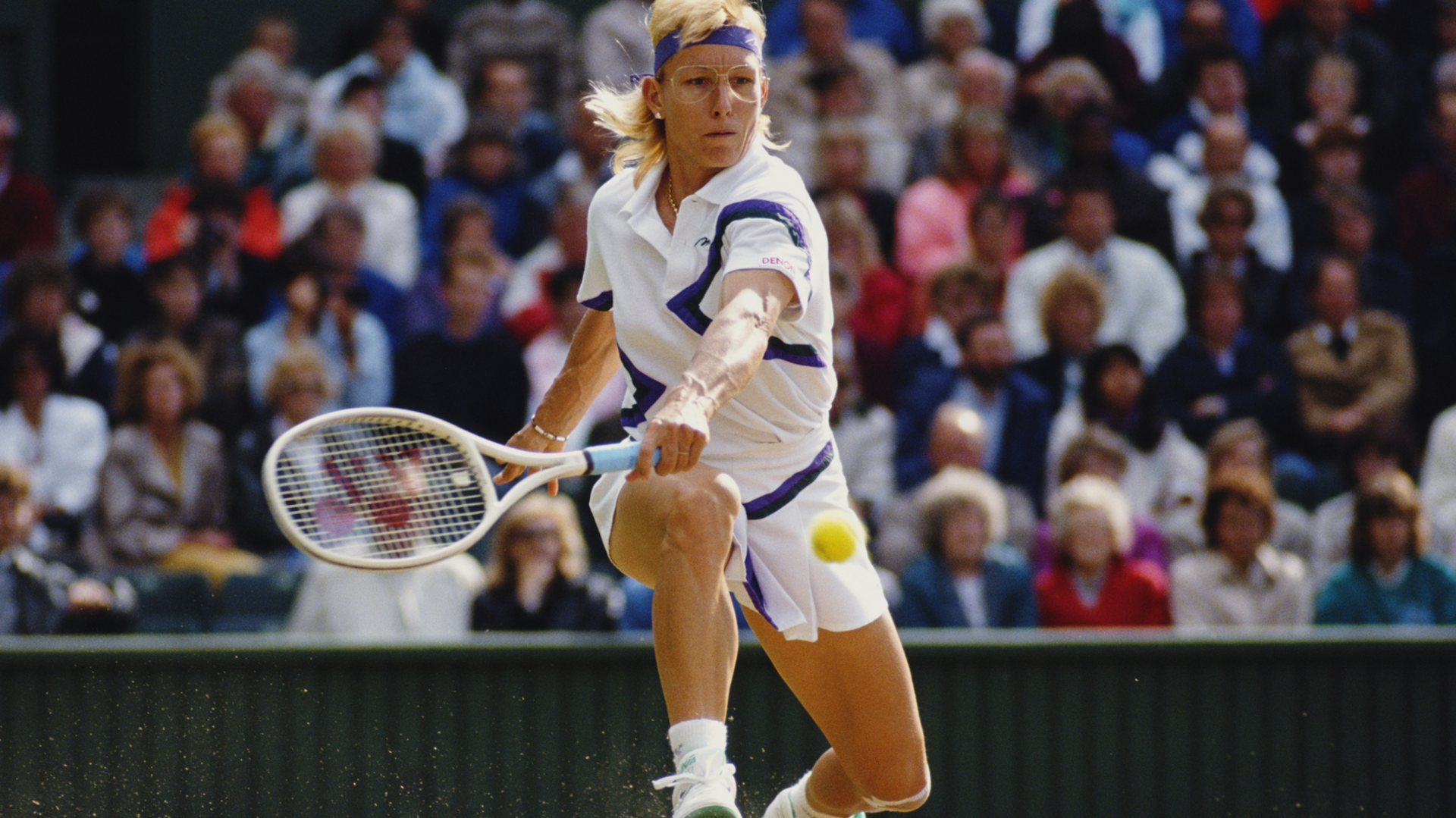 Martina Navratilova hits a backhand shot at Wimbledon 1990