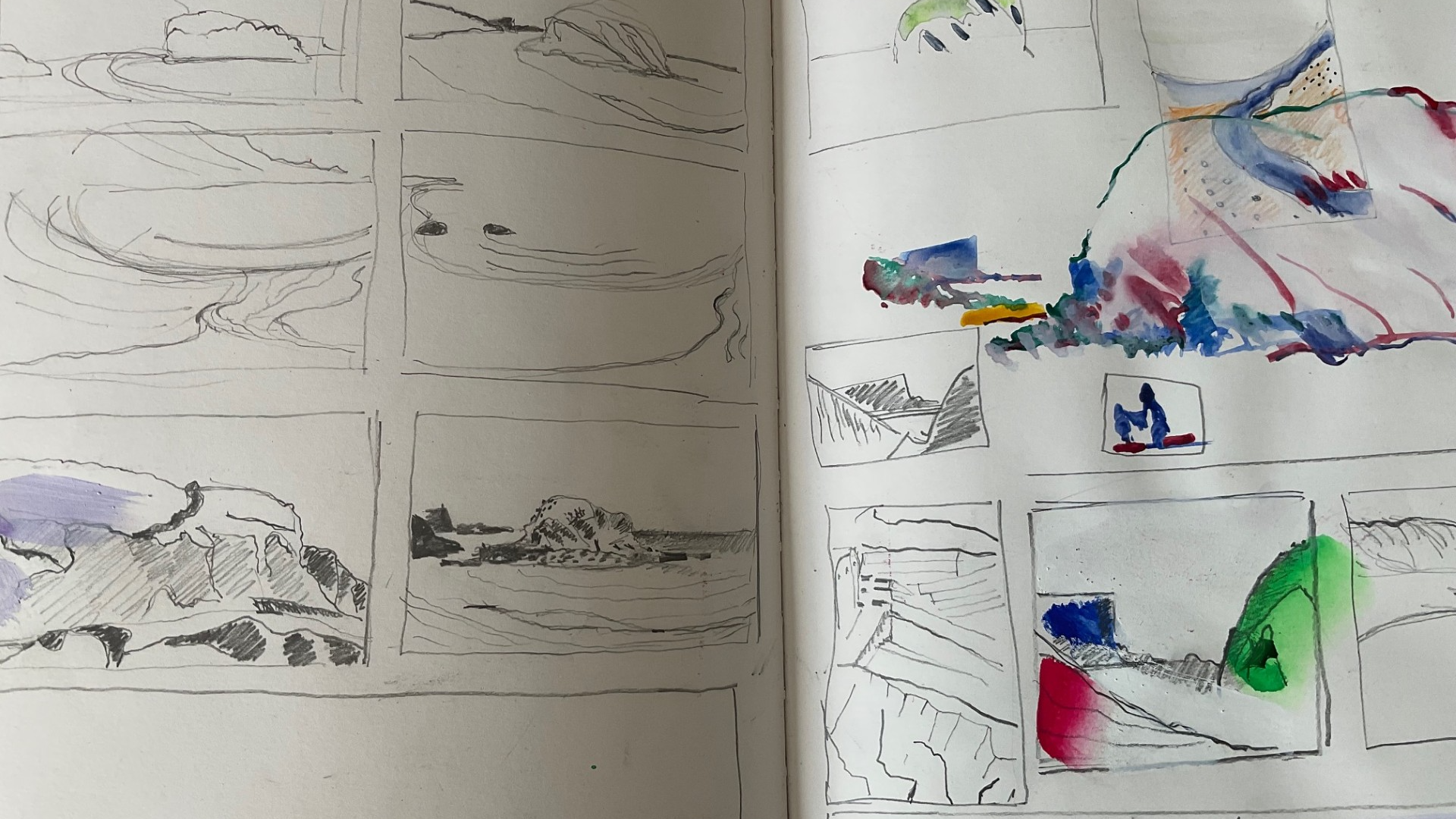 A close up of the inside of a sketchbook. There are drawings in pencil. There is some colour on the right page.