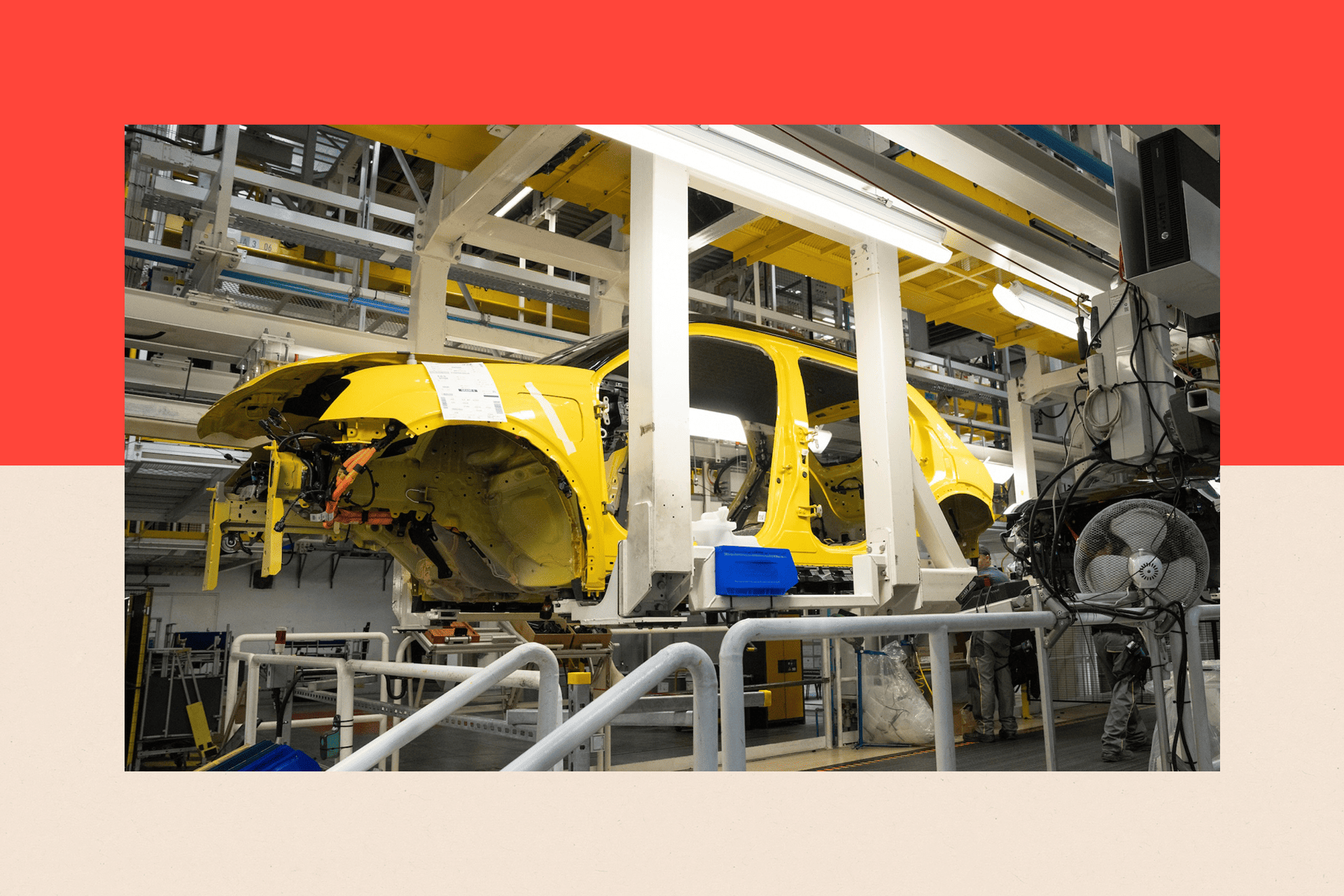 A Renault car on an automated assembly line