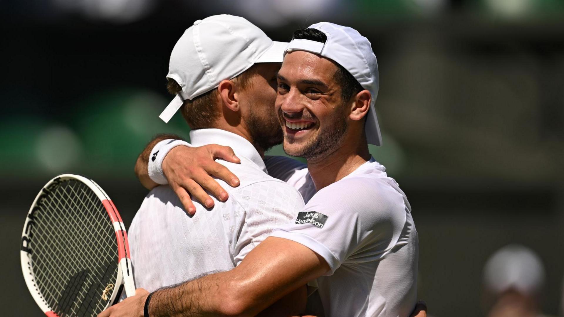 Lloyd Glasspool and Julian Cash hug after winning the 2025 Wimbledon title