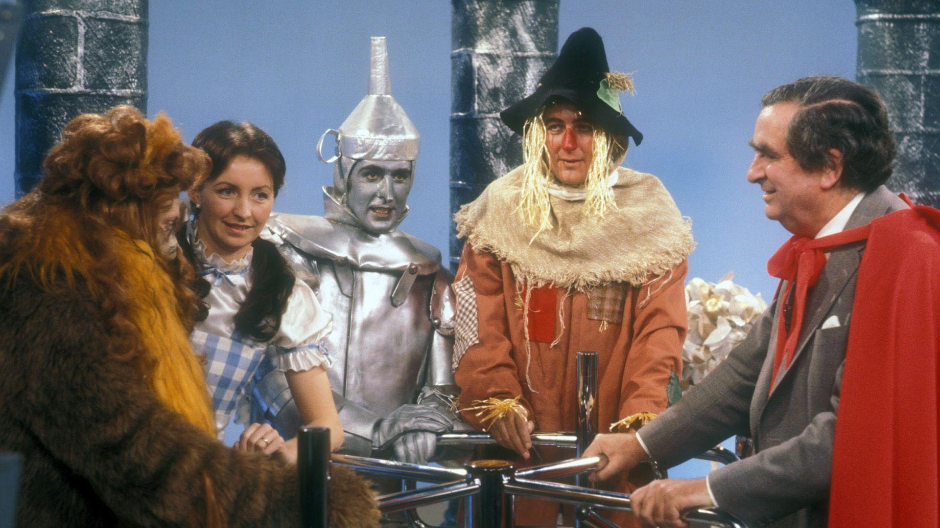 The Nationwide team offer their interpretation of the Wizard of Oz pantomime, featuring figures including Sue Lawley, Glyn Worsnip and Denis Healey