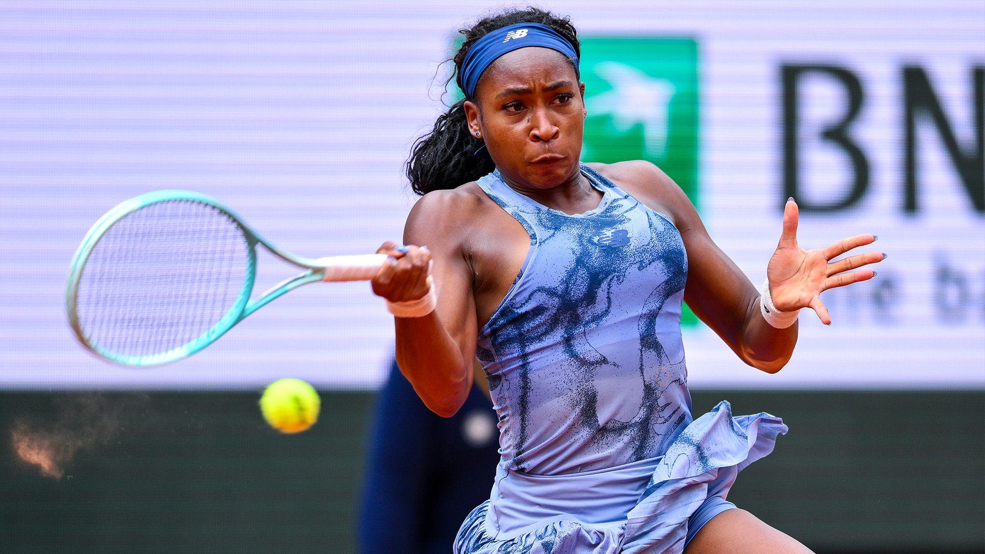 Coco Gauff in tennis action hitting the ball at the French Open