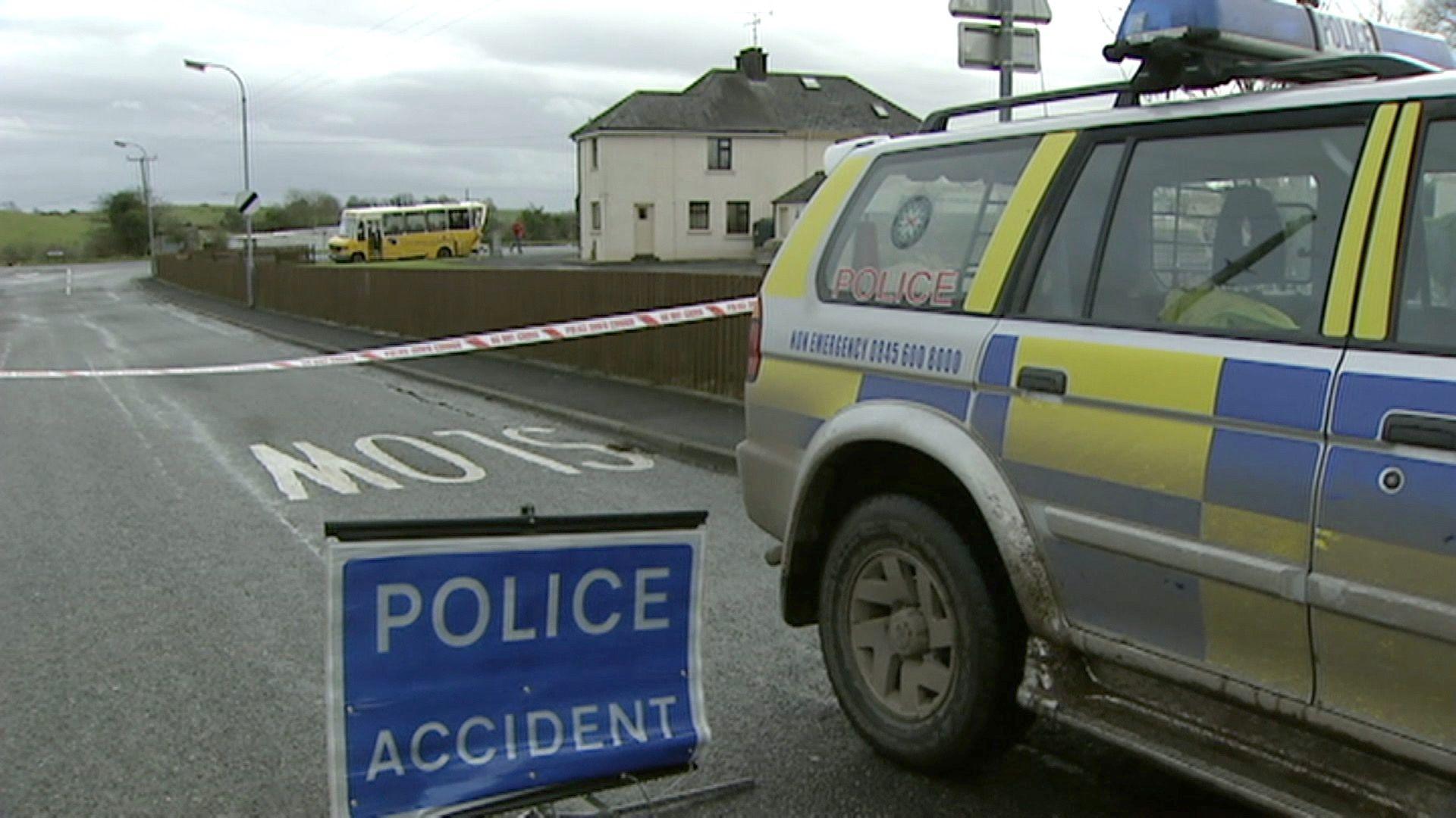 A police car sits at the scene of the closed road where Nicola Murray died 