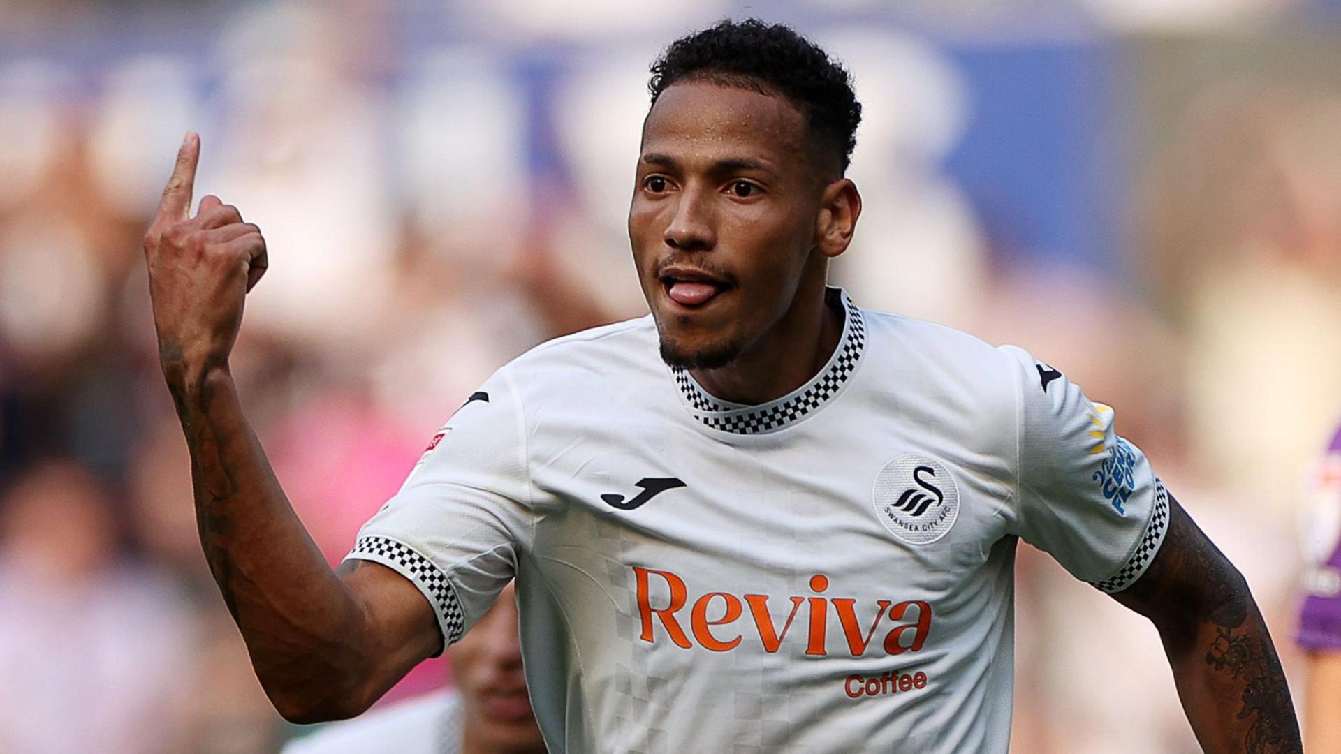 Ronald celebrates scoring for Swansea