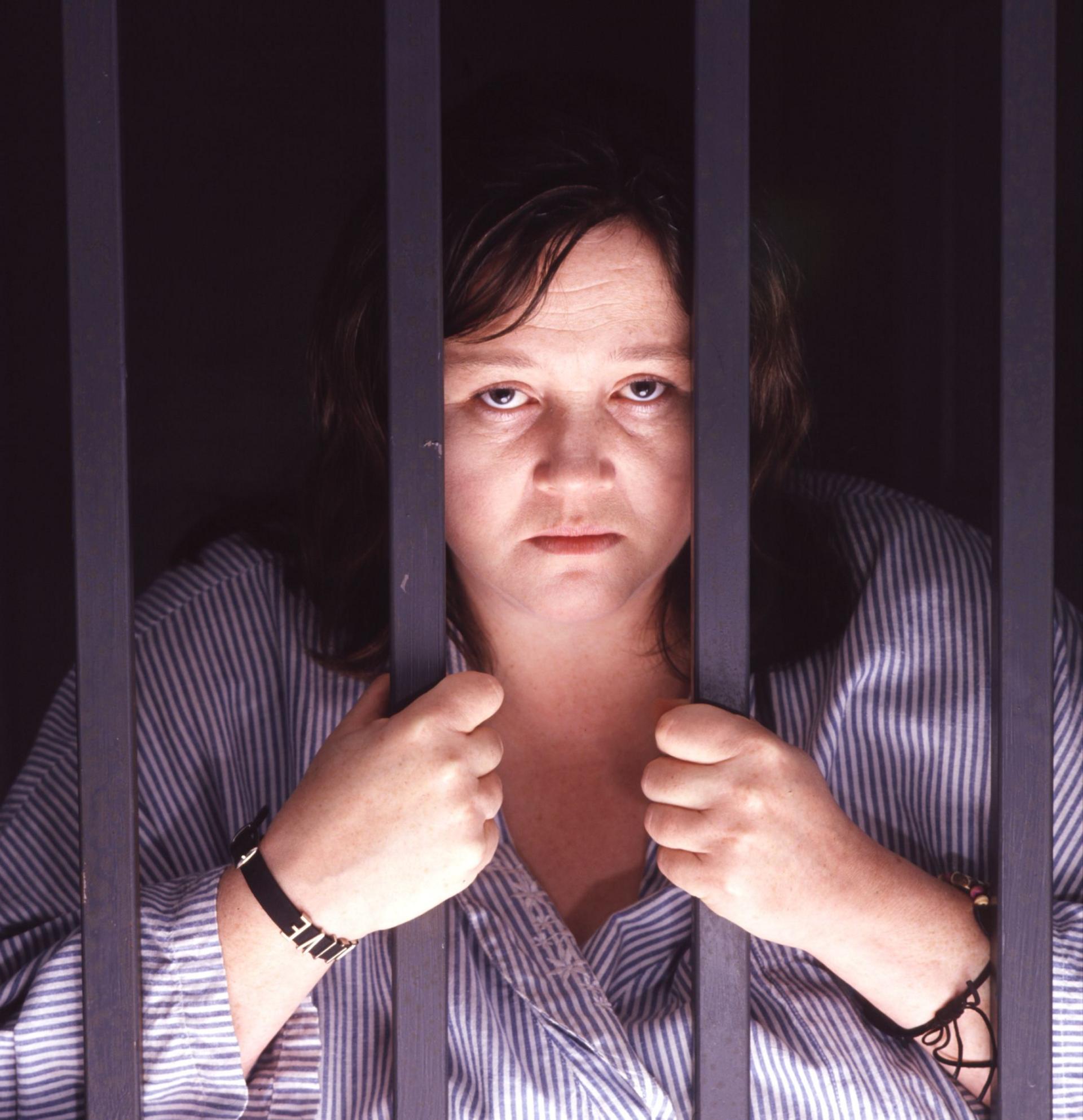 Image of Pauline Quirk behind bars in The Sculptress