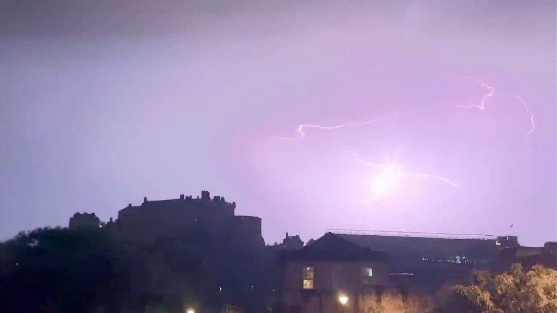 Lightning flashes over Edinburgh Castle