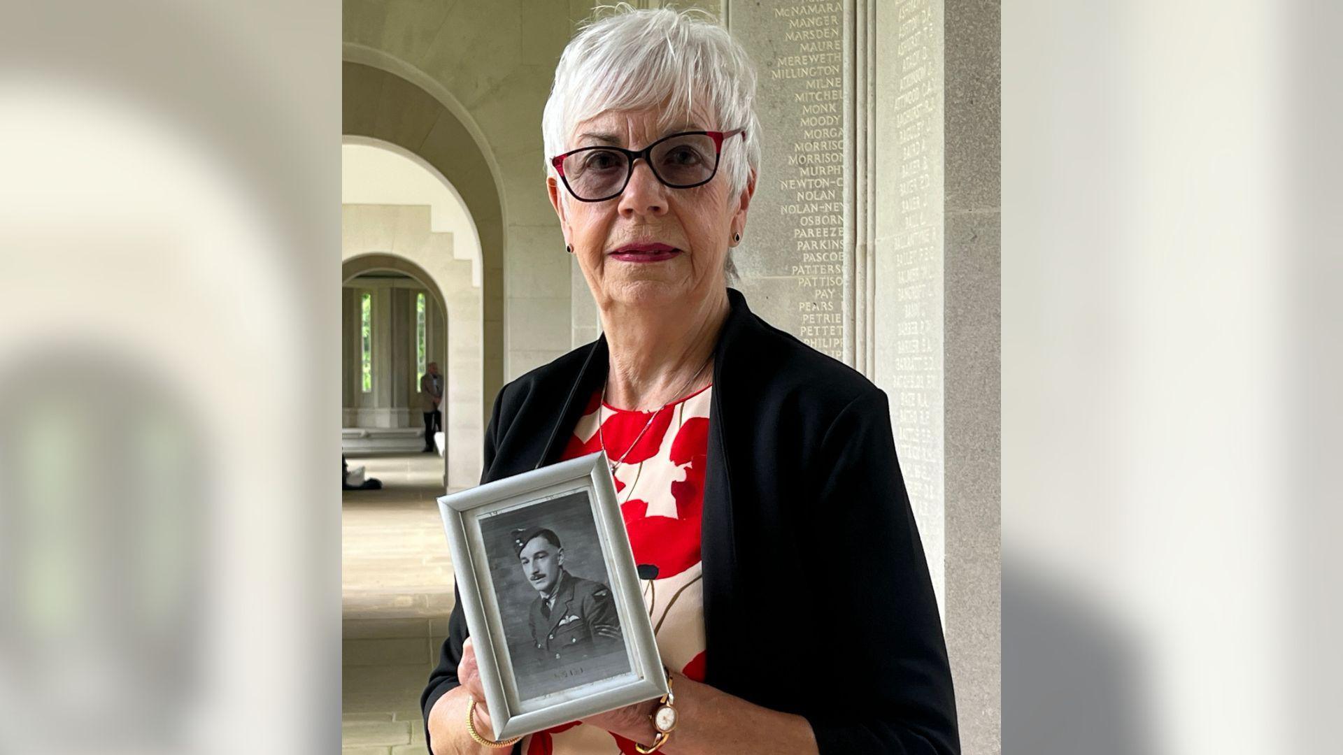 Frances Dodson with a photograph of her father, Francis John Brooker