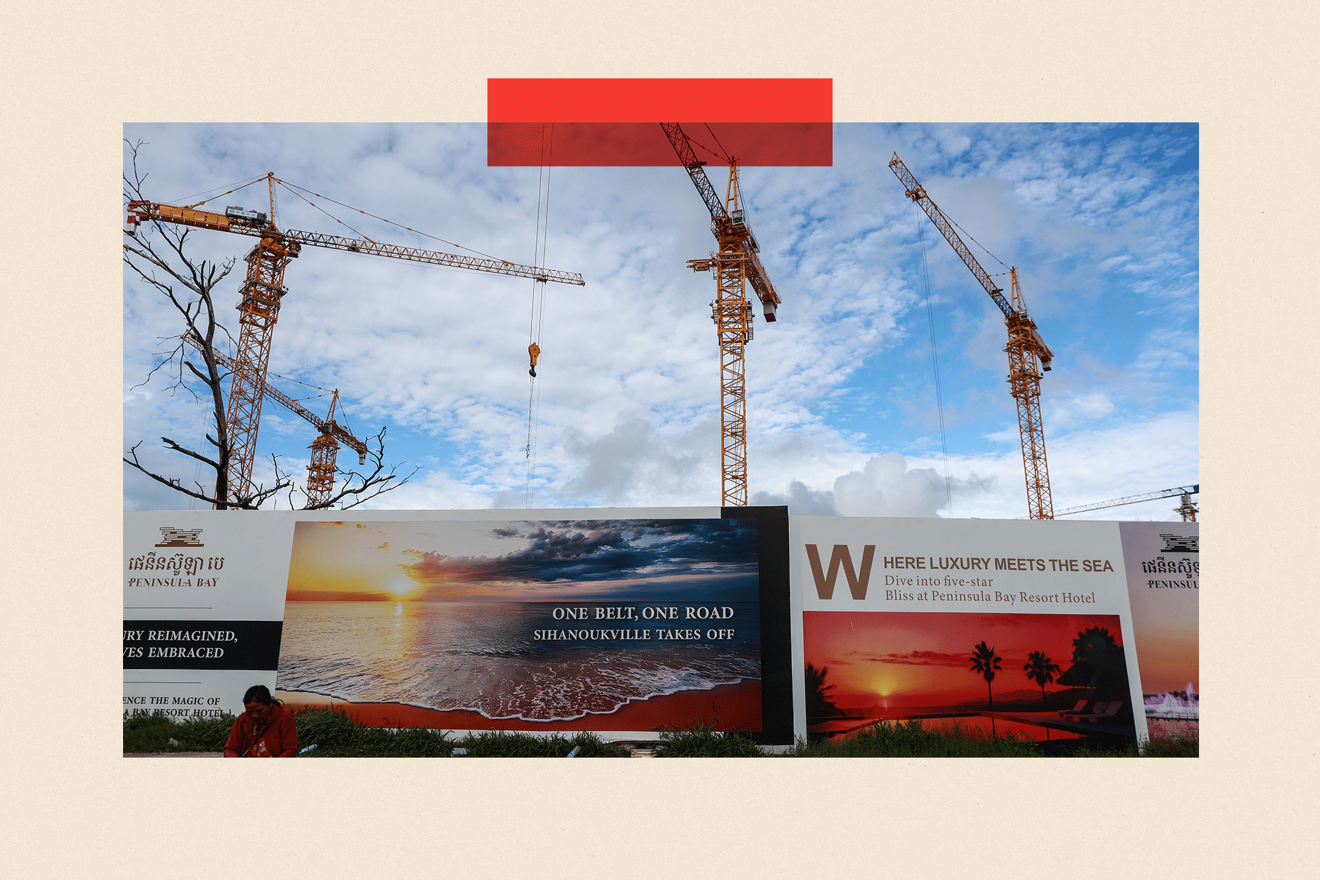 Billboards for the Belt and Road project in front of cranes