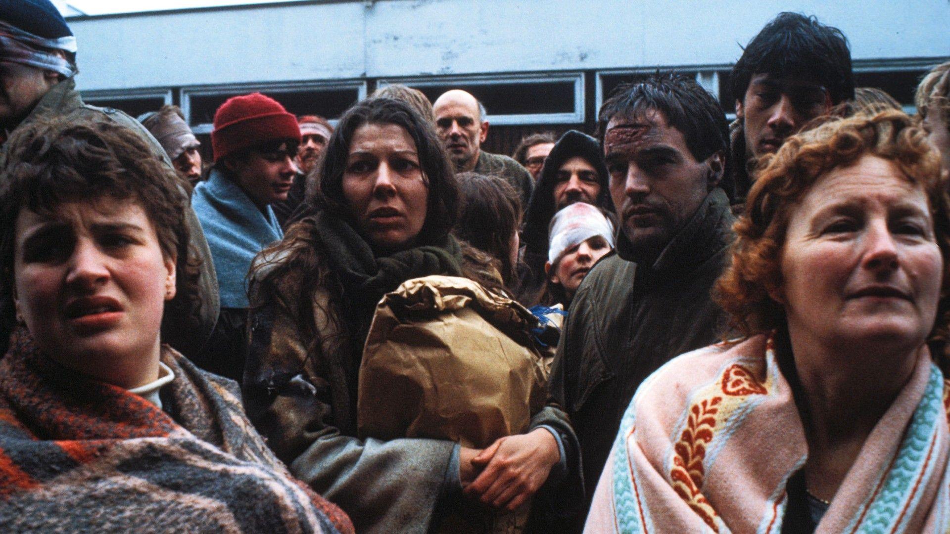 People looking bedraggled and desperate, in a still from the ˿ docudrama Threads