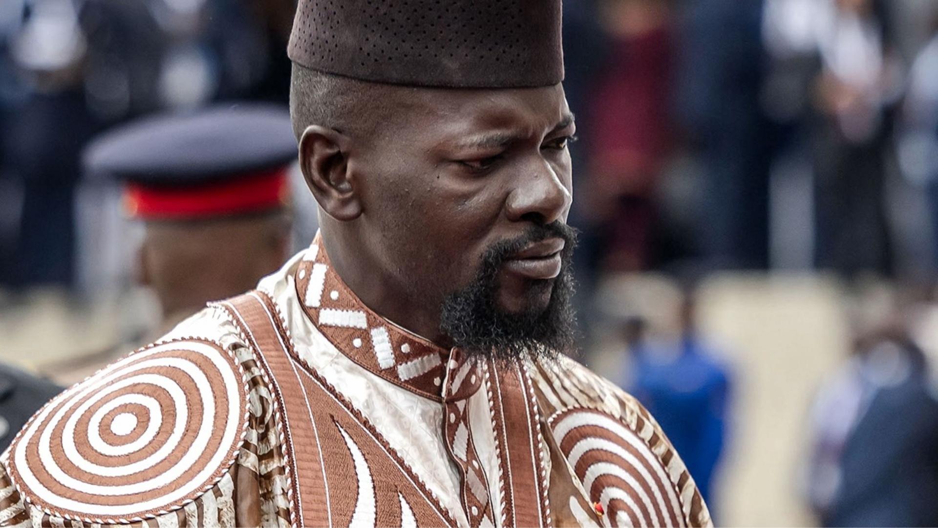 Guinea's President Mamady Doumbouya in a brown and white embroidered outfit in May 2026
