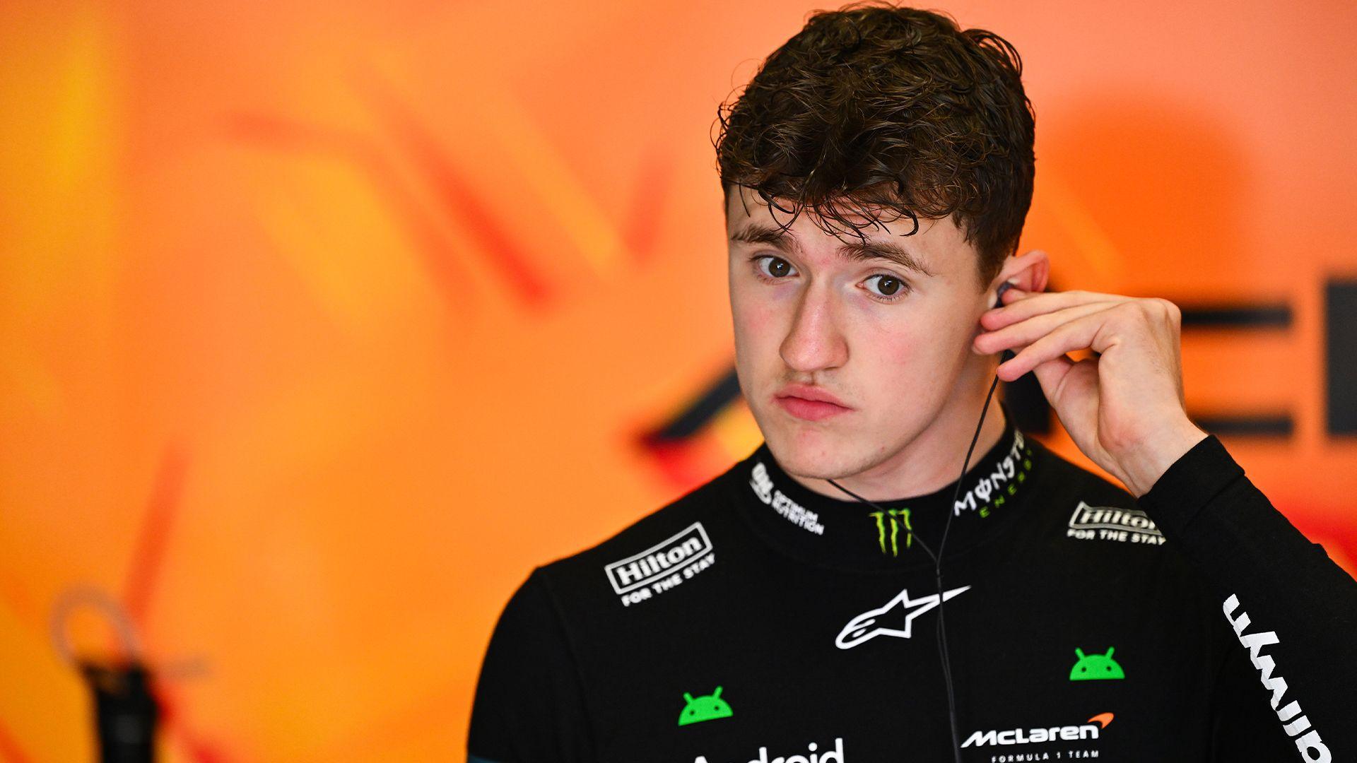 Alex Dunne prepares to get into his McLaren