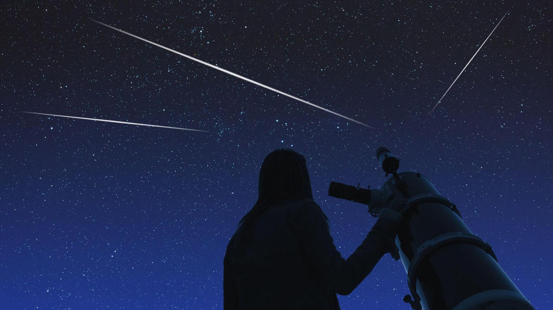 girl with telescope stargazing