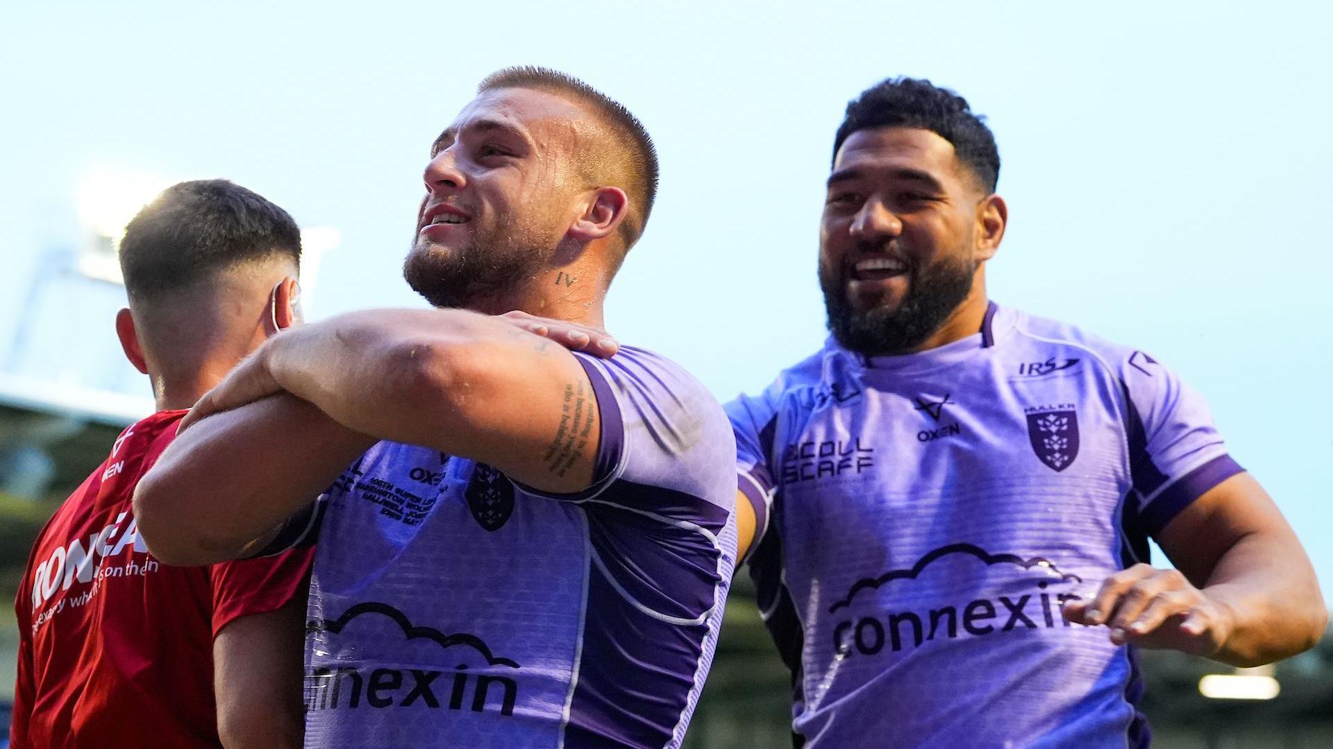 Mikey Lewis celebrates his try for Hull KR against Warrington Wolves