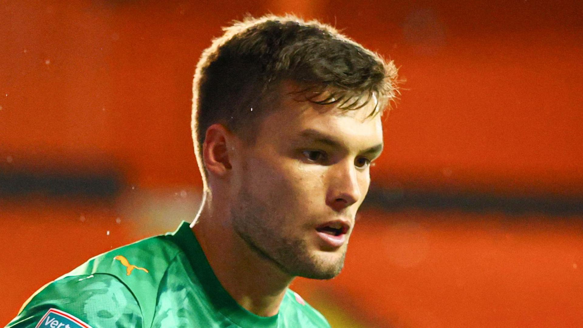Goalkeeper Ben Winterbottom in action for Barrow.