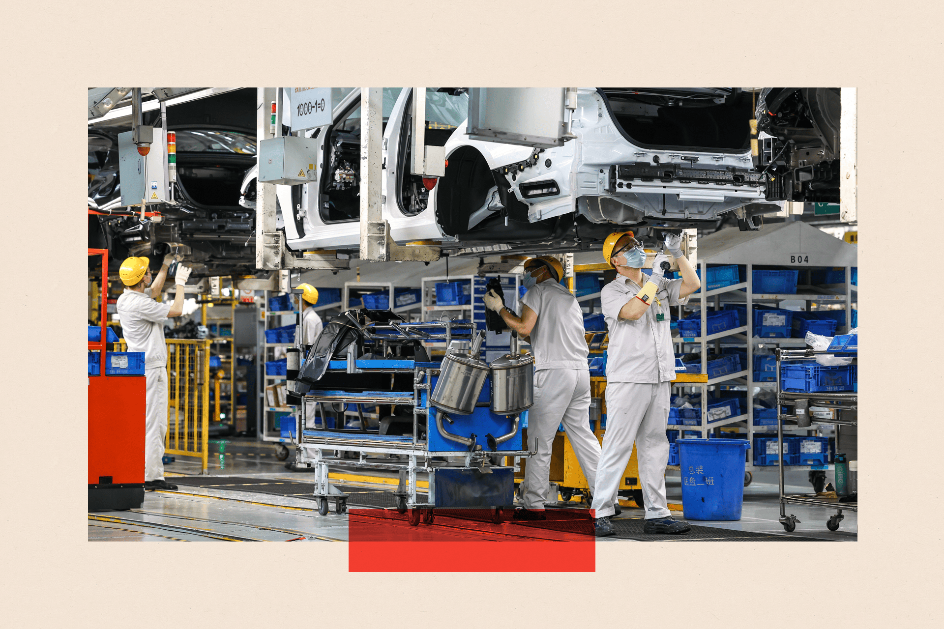 Employees work on the assembly line of Altima sedan at the Xiangyang plant of Dongfeng Nissan Passenger Vehicle Company 
