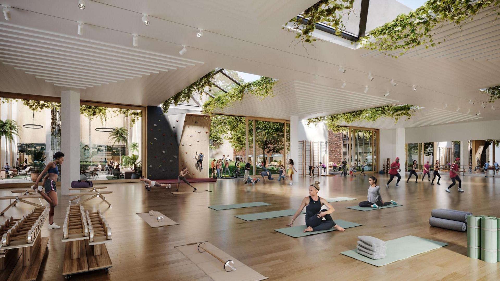 An architect's visualisation showing a performance space with people on exercise mats, a woman stretching her legs, and a group doing an exercise class.