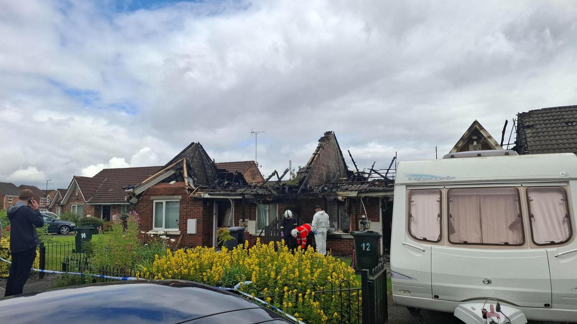 The aftermath of a fire on The Crescent, in the Buttershaw area of Bradford