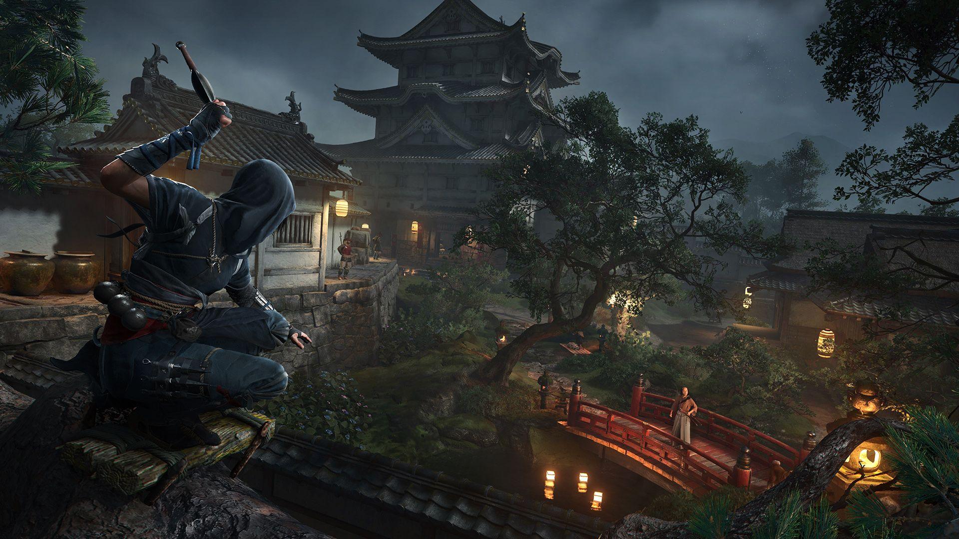 A still from the Assassins Creed game, showing a character dressed in blue covertly overlooking an area with trees and a home - looking at another male character who is standing on a bridge below.