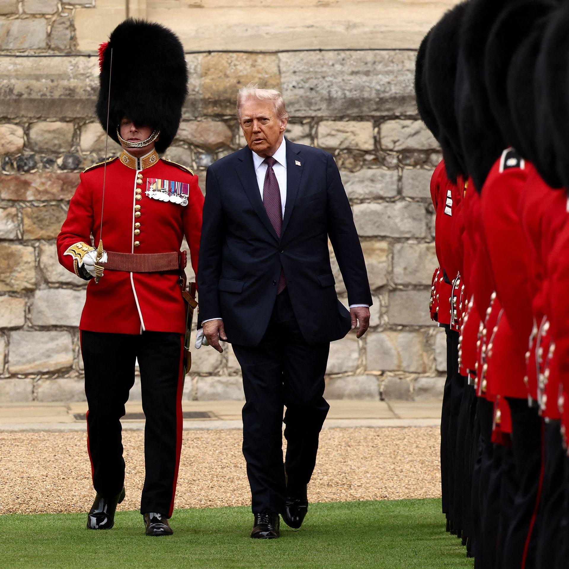 US President Donald Trump inspects the Guard of Honour  at Windsor Castle
